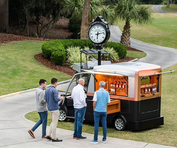 Guests enjoy Dewar’s mobile bar cart during the kick-off event on Thursday evening