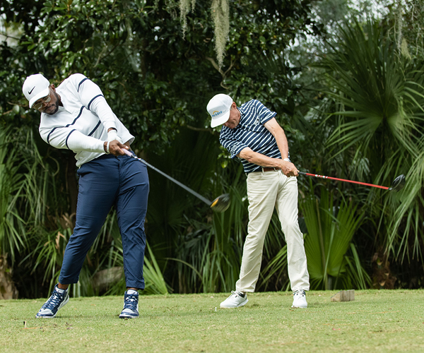 Roger Steele & Davis Love III teeing off 
Reese More Photography